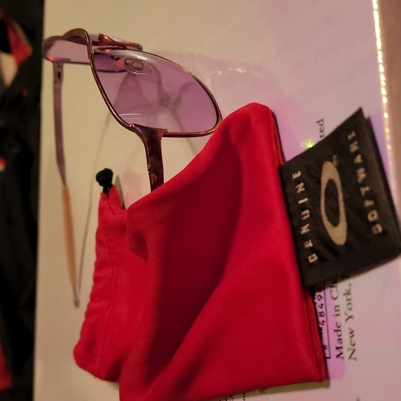 Genuine Women's Oakley sunglasses with pink frames and lenses. - Picture 3 of 3